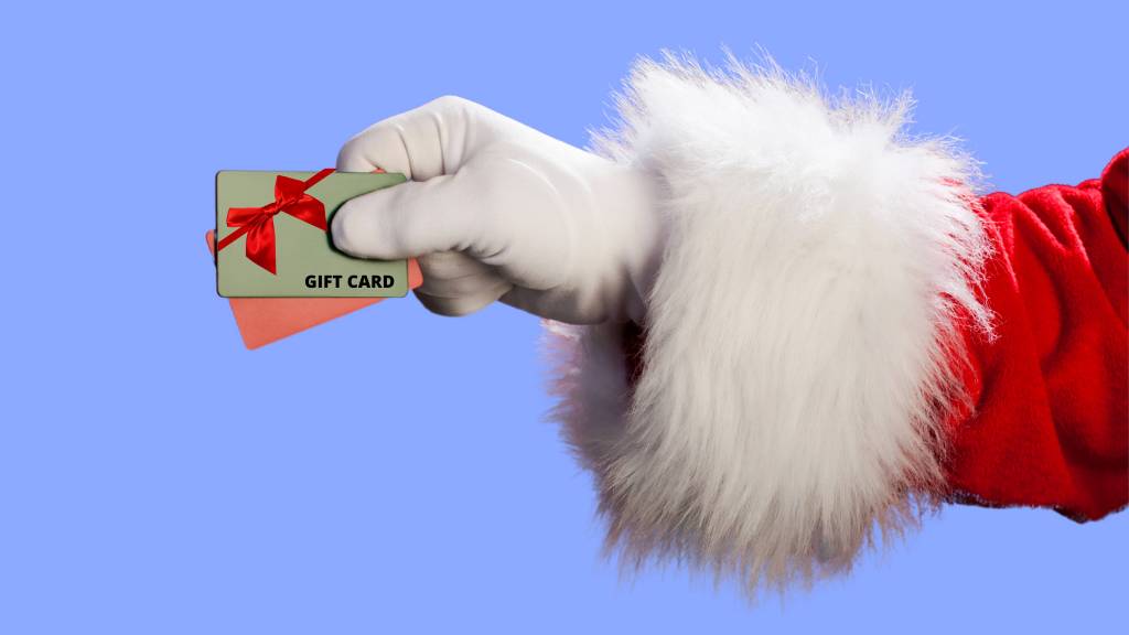 Santa giving a gift card